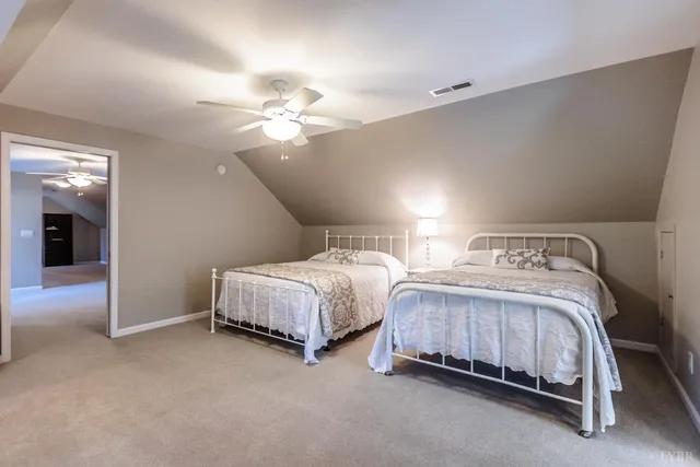 a view of a lake with a yard