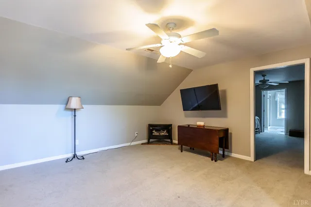 a view of lake with green space