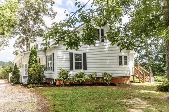 a view of a backyard of a house