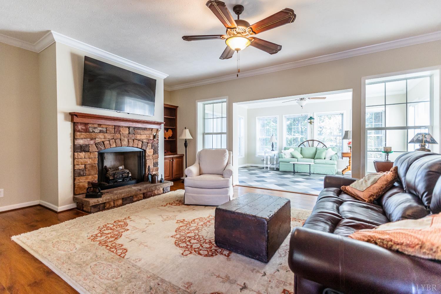 1562 Rocks Church Road Pamplin, VA 23958 - Photo 10 of 30 a living room with furniture and a fireplace