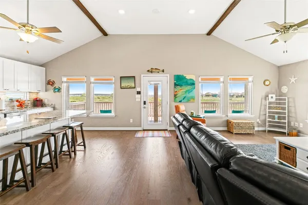 a living room with furniture and a window