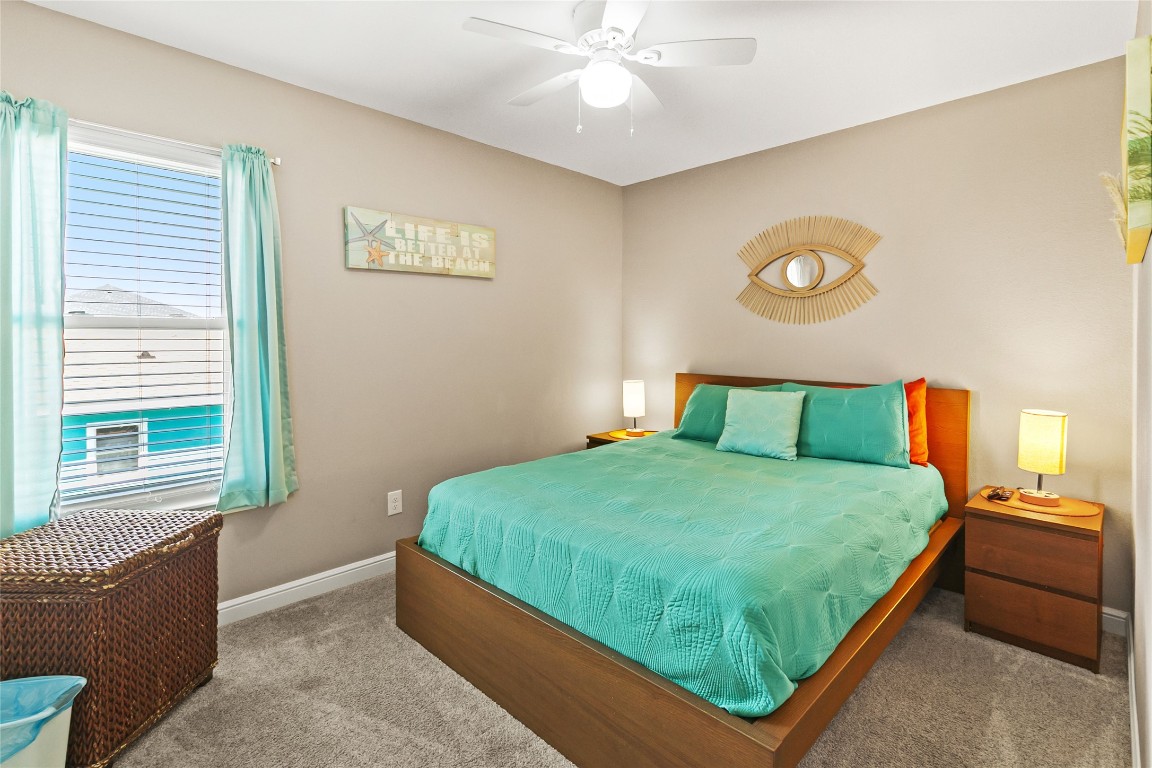 147 Pieces Of 8 Freeport, TX 77541 - Photo 20 of 33 a bedroom with a bed and a window