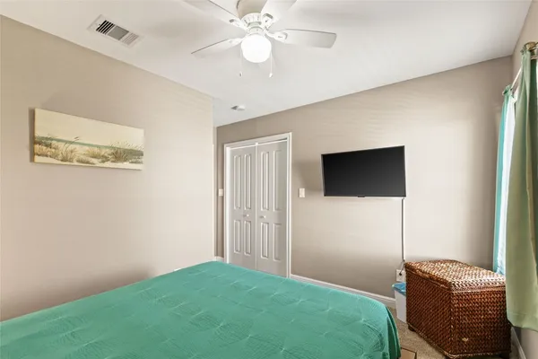 a bedroom with furniture and a fireplace