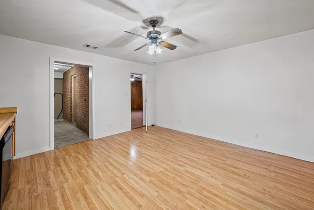 a view of a livingroom with a ceiling fan