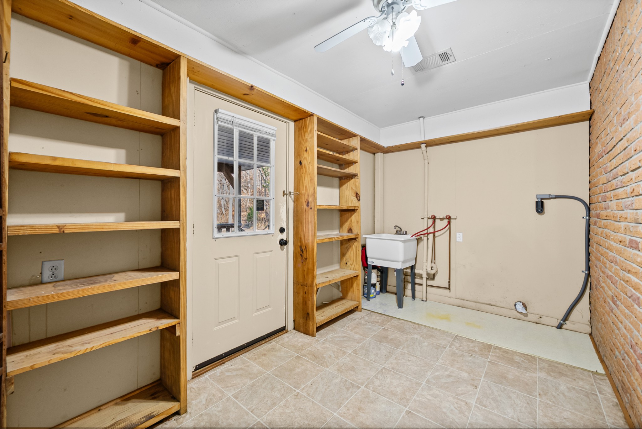 1667 McWhorter Road Cunningham, TN 37052 - Photo 14 of 35 a view of an empty room with a cabinet