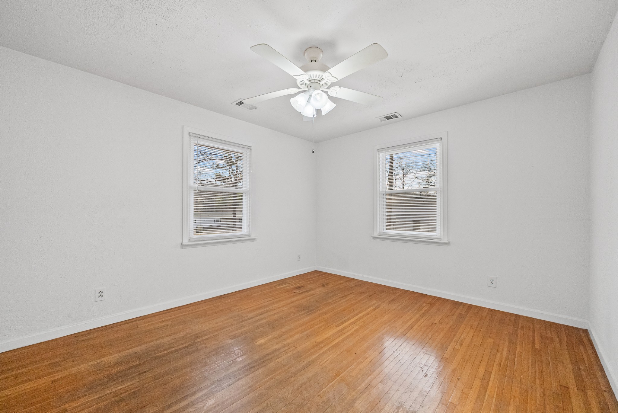 1667 McWhorter Road Cunningham, TN 37052 - Photo 17 of 35 a view of an empty room with wooden floor