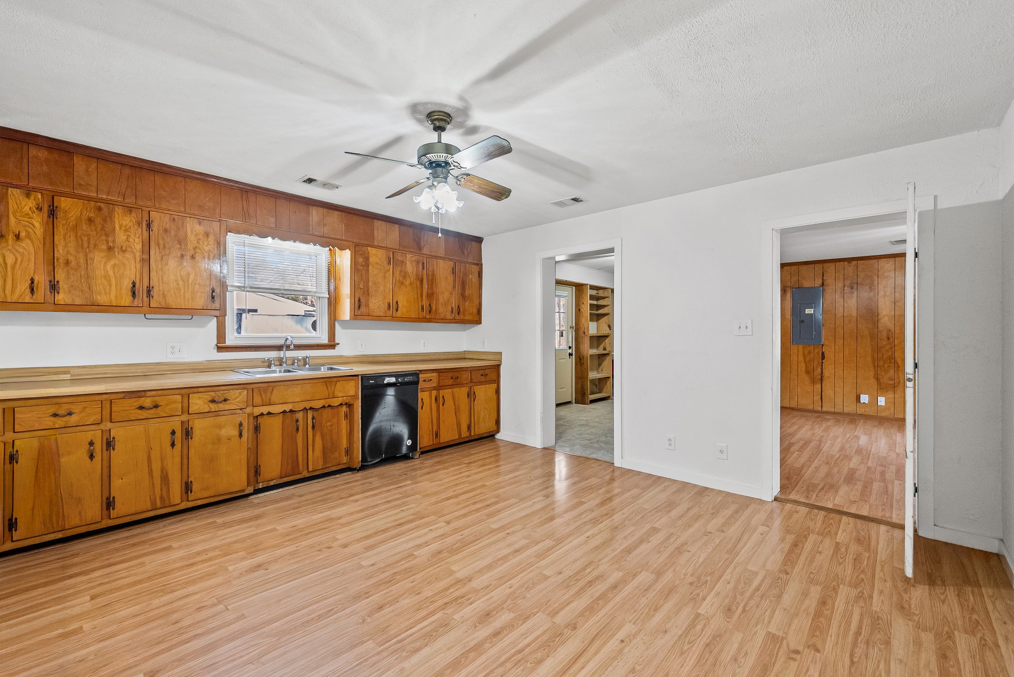 1667 McWhorter Road Cunningham, TN 37052 - Photo 10 of 35 a large kitchen with stainless steel appliances a large counter top a sink and a refrigerator