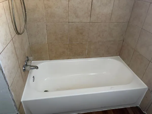 a bathroom with a bath tub
