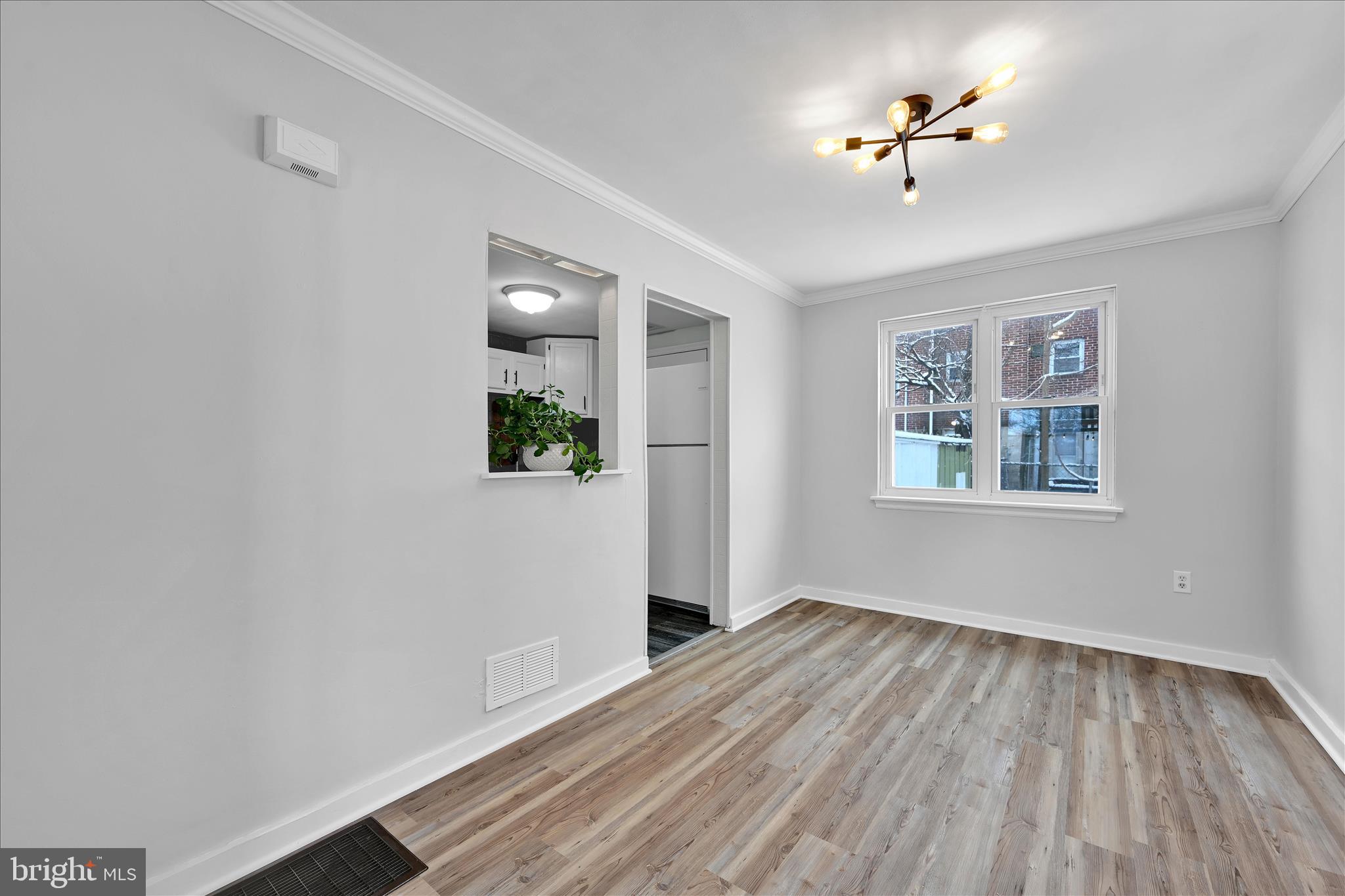 716 South Franklin Street Lancaster, PA 17602 - Photo 11 of 35 a view of empty room with wooden floor and fan