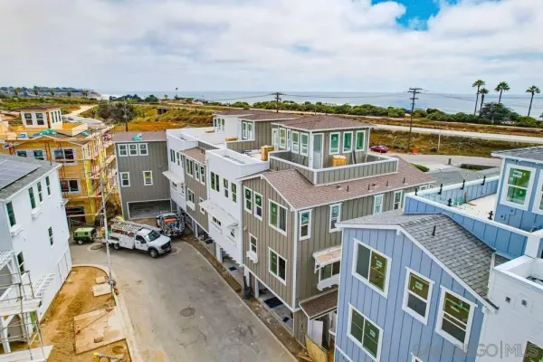 a view of a city with lawn chairs