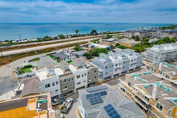 a view of an ocean and city