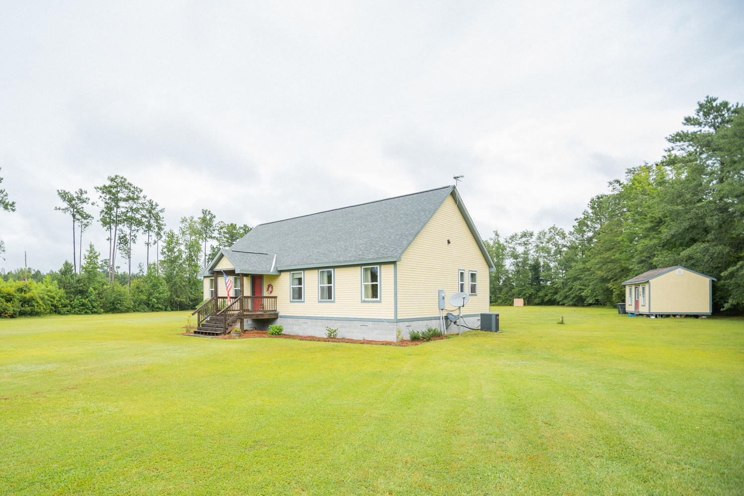 14228 Round O Road Round O, SC 29474 - Photo 30 of 72 Tiny Home on the right