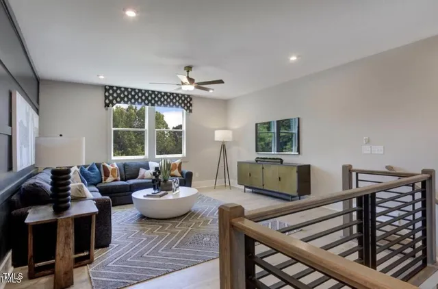 a living room with furniture and window