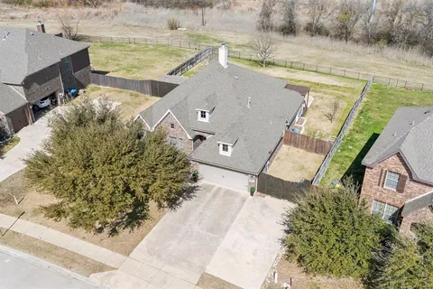 a view of a house with a lake view