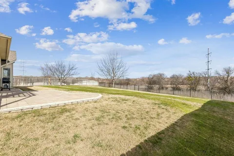 a view of a swimming pool with an ocean view