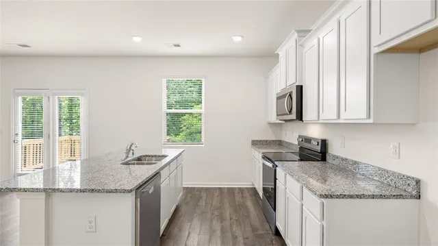 a view of empty room with windows