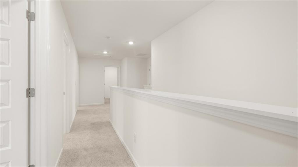 621 Lobelia Way Locust Grove, GA 30248 - Photo 23 of 42 a view of hallway with bathtub