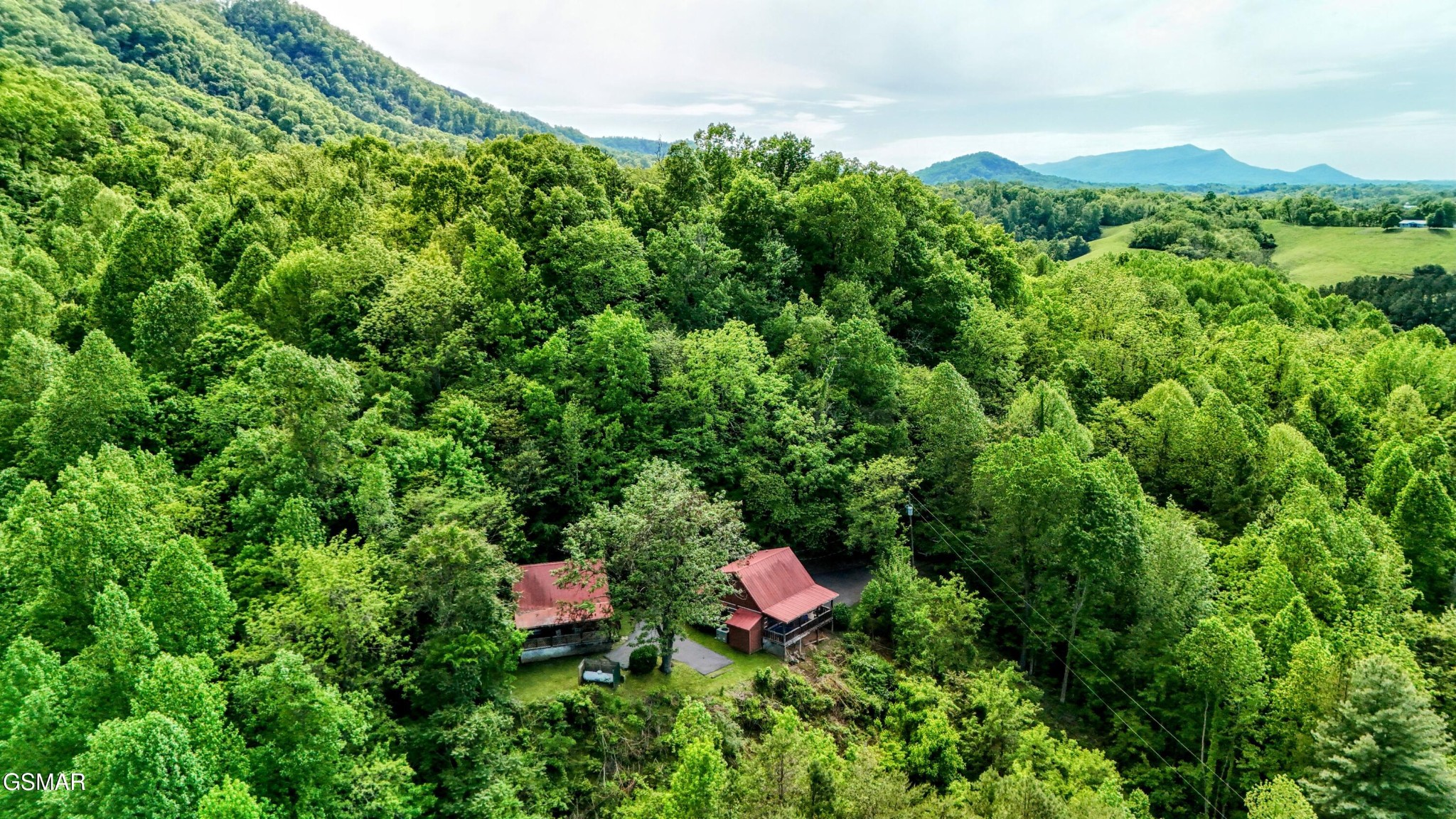 2570 Pittman Center Road Sevierville, TN 37876 - Photo 58 of 61 an aerial view of a house with a yard