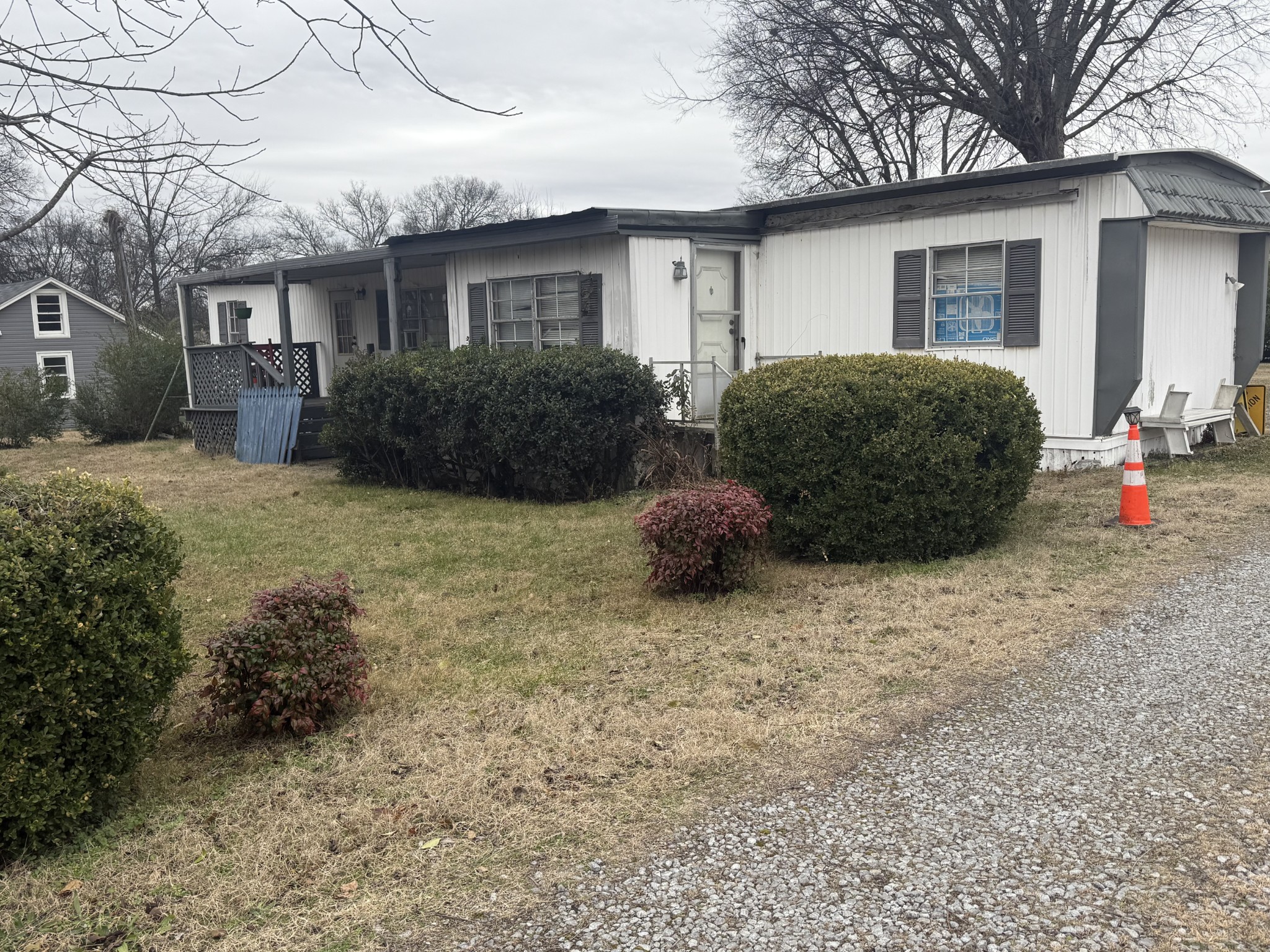 302 Walton Ferry Road Hendersonville, TN 37075 - Photo 4 of 5 a view of a house with a outdoor space and a yard
