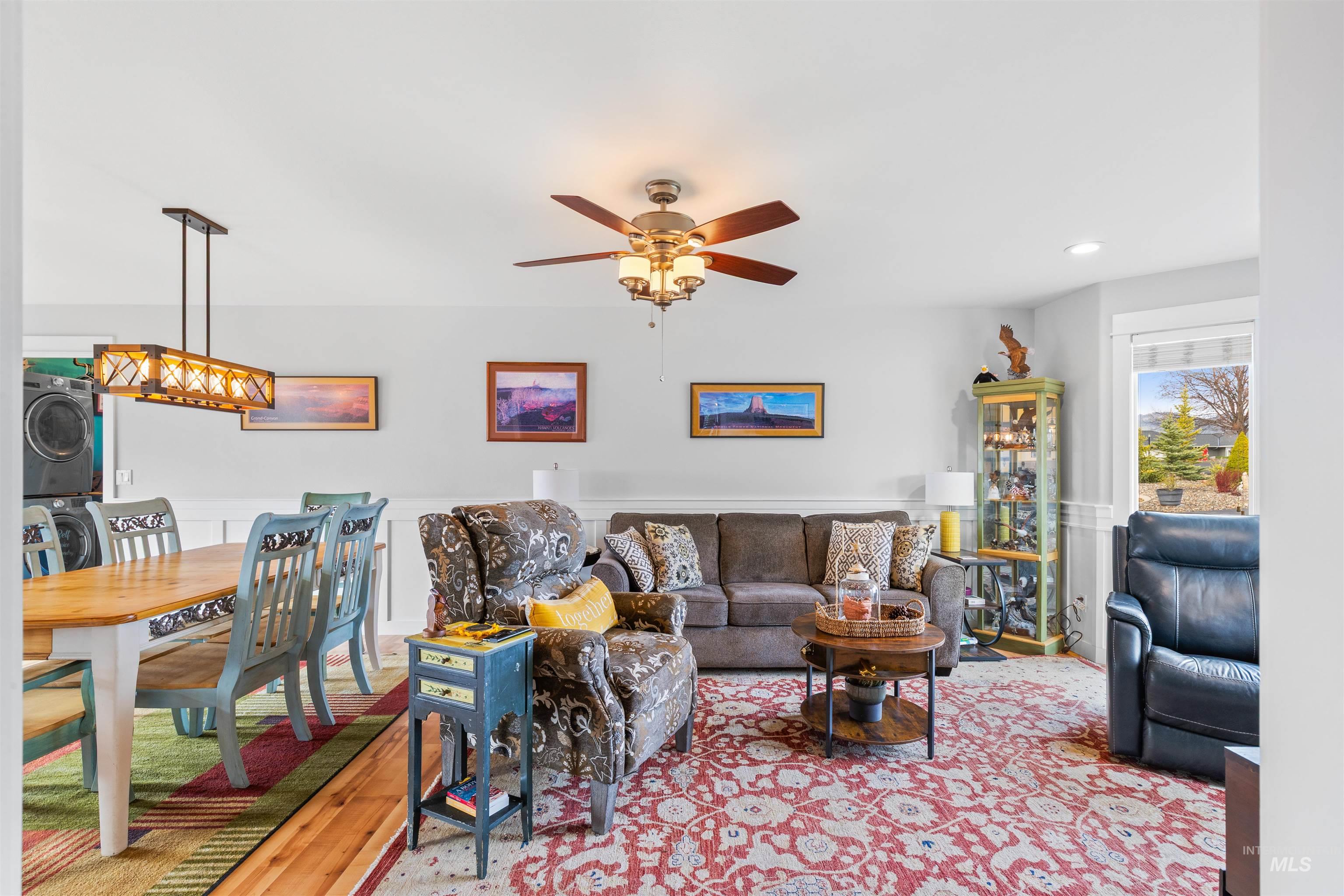 2435 Arborcrest Road Moscow, ID 83843 - Photo 17 of 48 Living area featuring wood finished floors, stacked washer and clothes dryer, recessed lighting, and ceiling fan