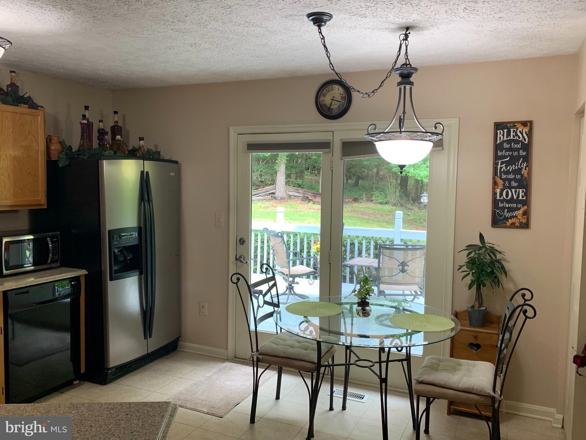 3123 Laurel View Drive Abingdon, MD 21009 - Photo 49 of 135 a view of a dining room with furniture window and outside view