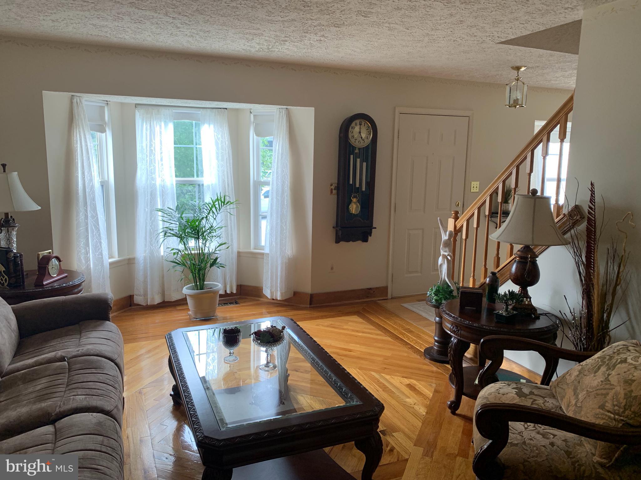 3123 Laurel View Drive Abingdon, MD 21009 - Photo 75 of 135 a living room with furniture and wooden floor