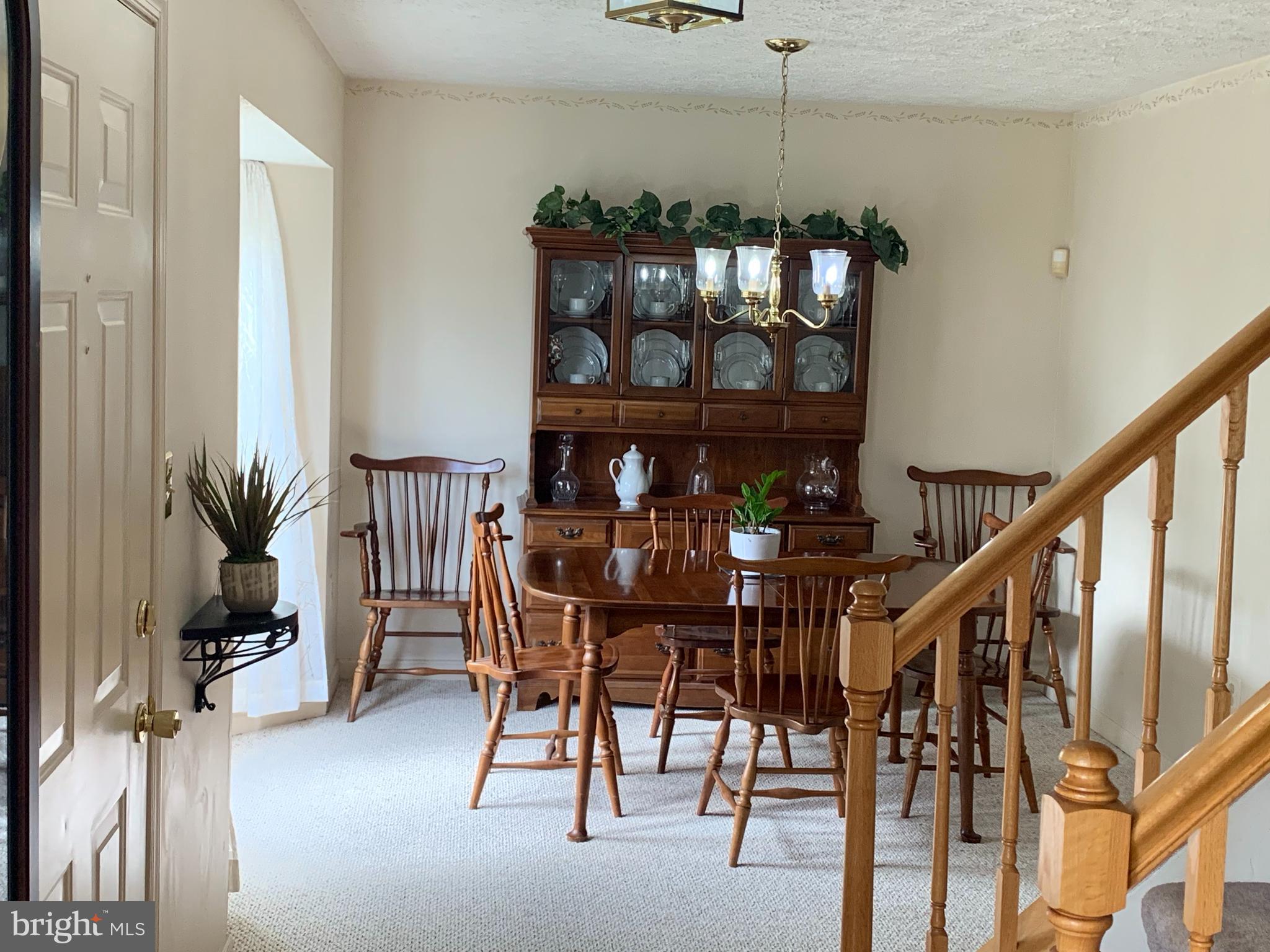 3123 Laurel View Drive Abingdon, MD 21009 - Photo 77 of 135 a view of a dining room with furniture and chandelier