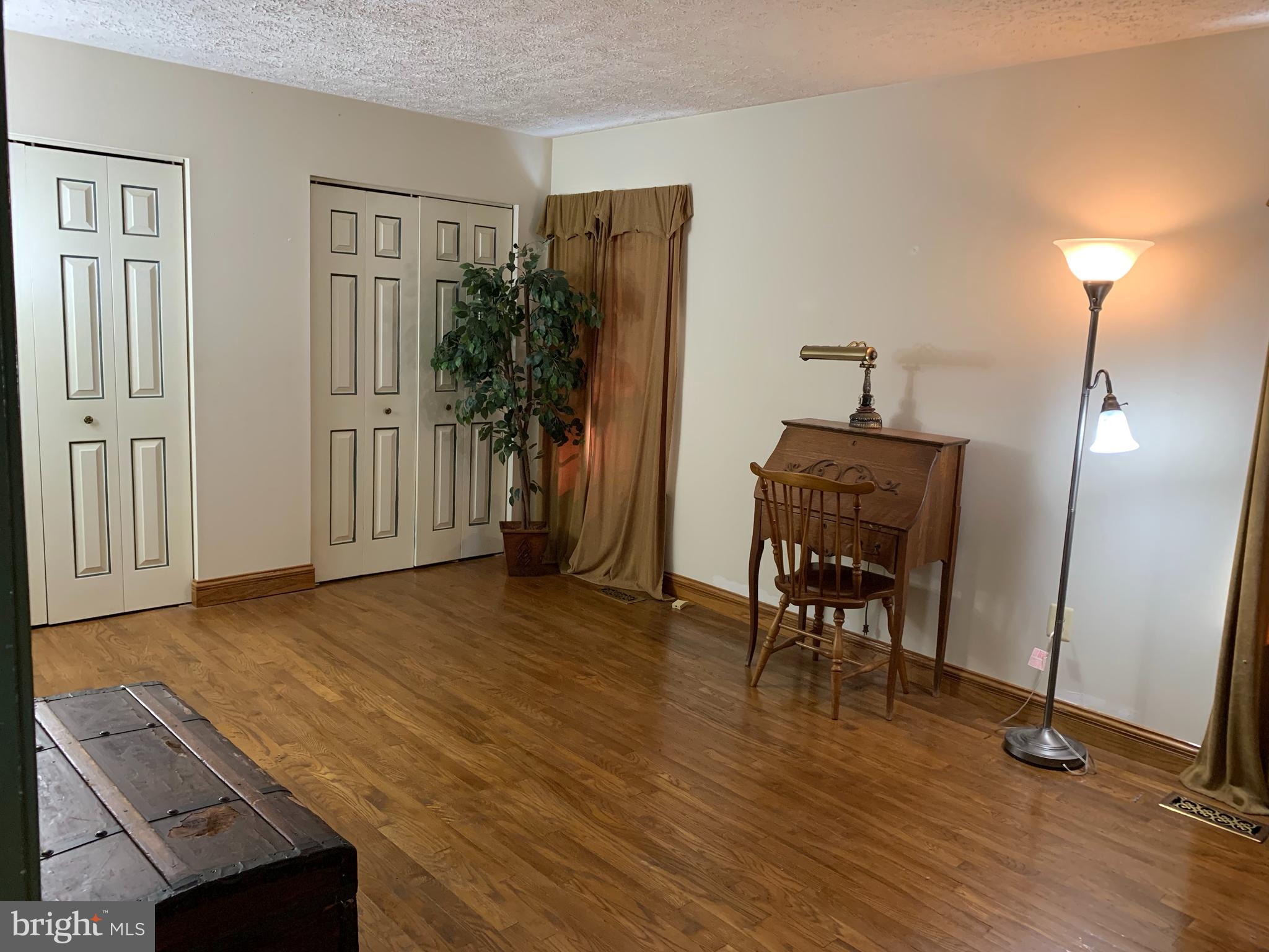3123 Laurel View Drive Abingdon, MD 21009 - Photo 83 of 135 a view of a livingroom with furniture and a wooden floor