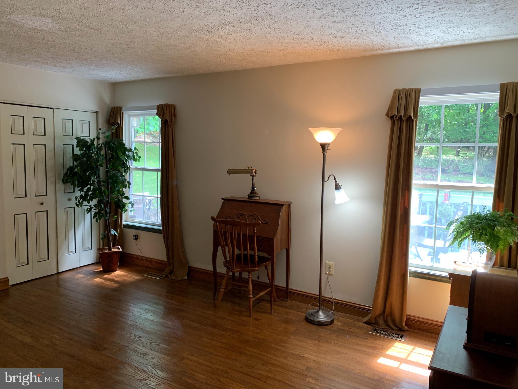 3123 Laurel View Drive Abingdon, MD 21009 - Photo 88 of 135 a view of a livingroom with furniture and a potted plant