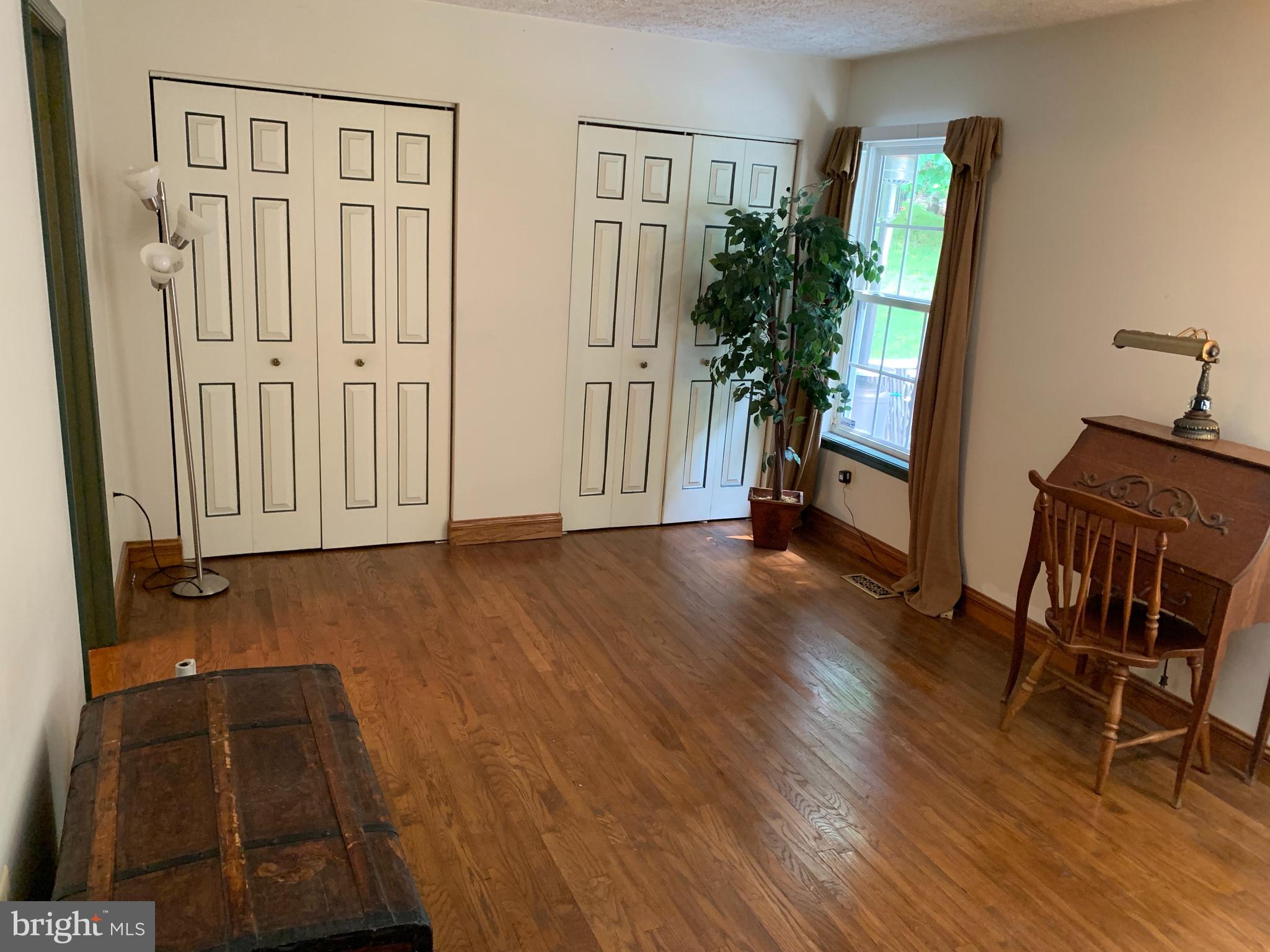 3123 Laurel View Drive Abingdon, MD 21009 - Photo 95 of 135 a view of a livingroom with furniture and wooden floor