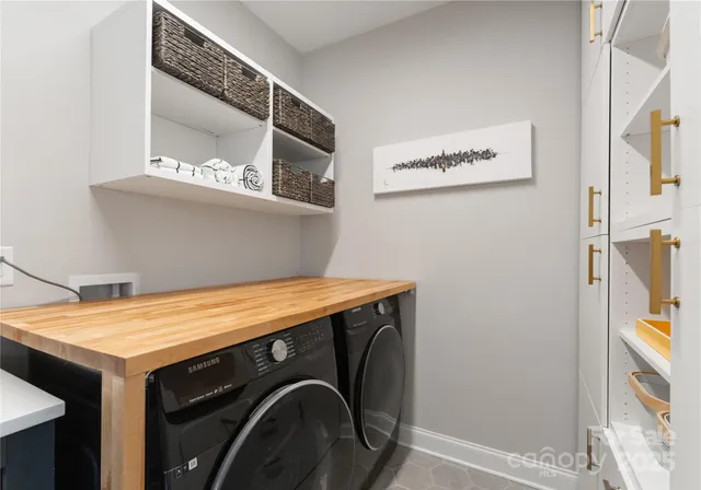 a utility room with dryer and washer