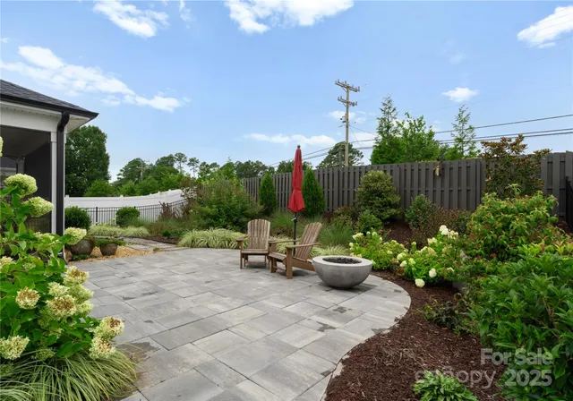 a garden view with a seating space