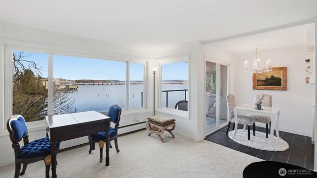 a living room with a couch and a large window