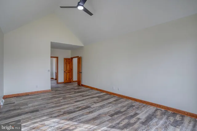 an aerial view of a house with a garden