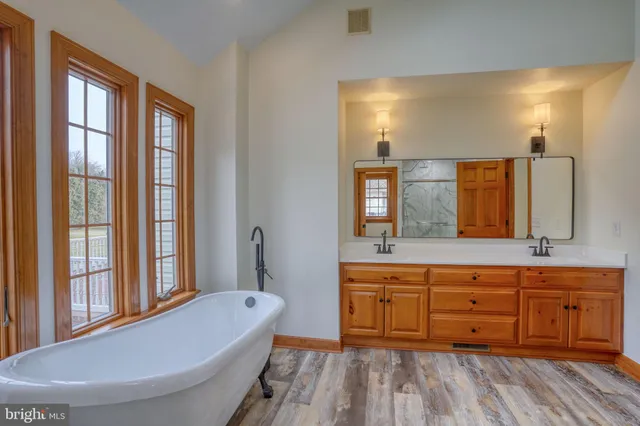 a view of a brick house with a large windows