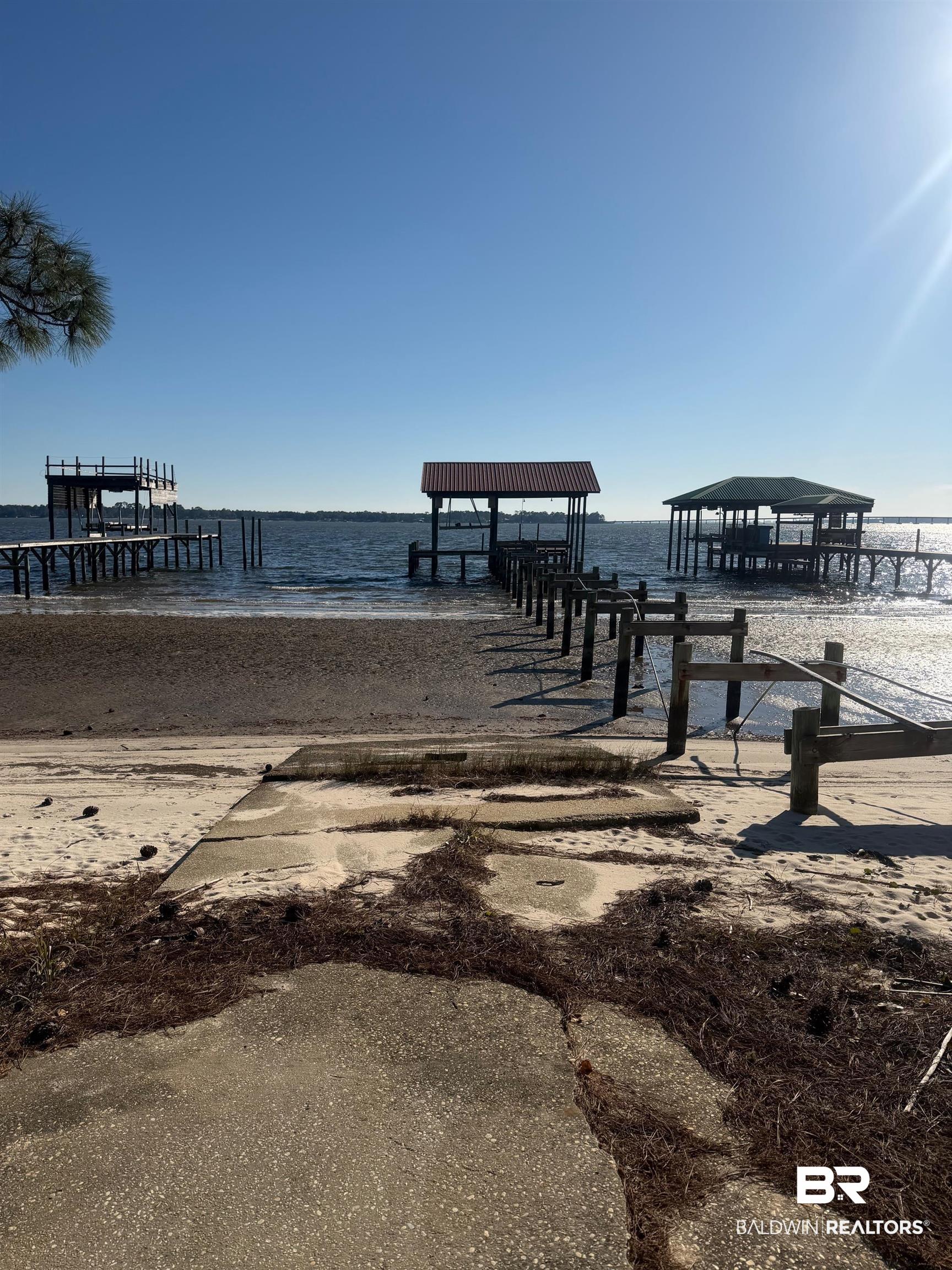 35776 Boykin Boulevard Lillian, AL 36549 - Photo 7 of 14 Dock with a water view and boat lift