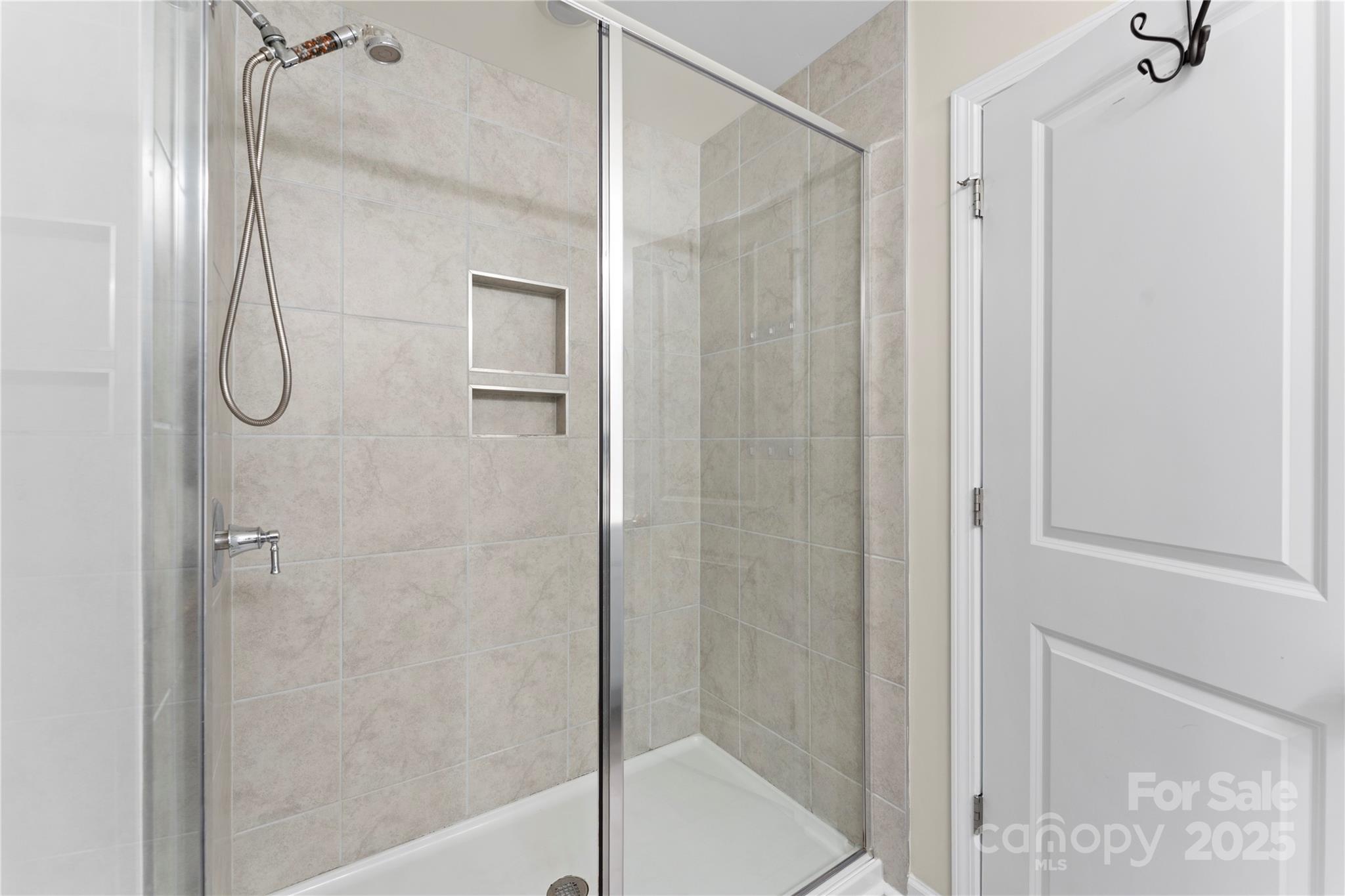 5215 Maynard Hl Drive Monroe, NC 28110 - Photo 20 of 34 a bathroom with a shower