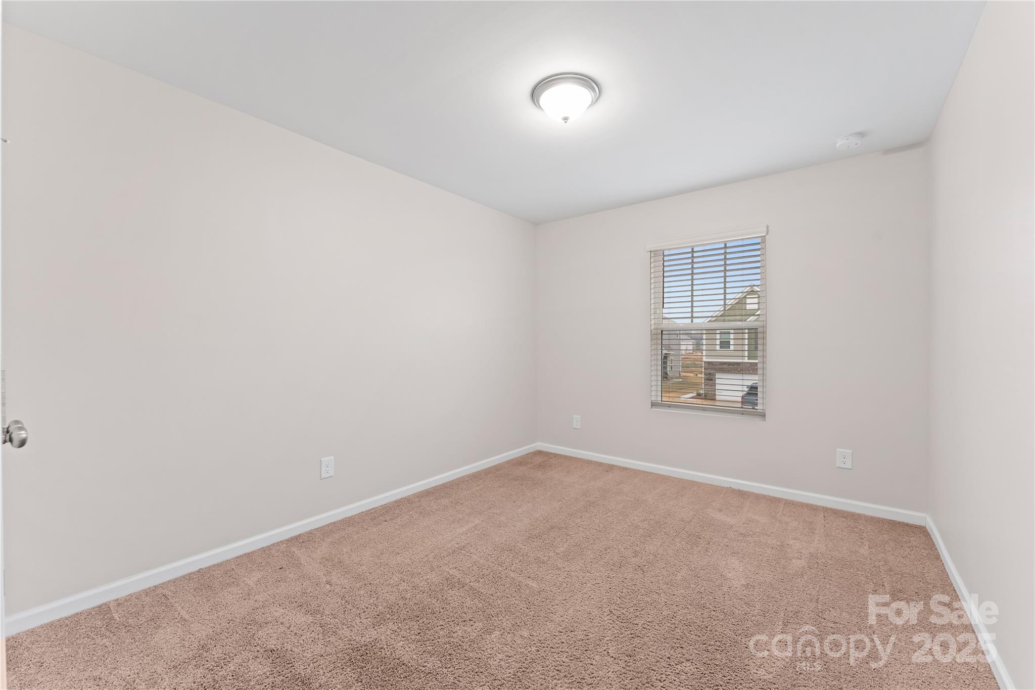 5215 Maynard Hl Drive Monroe, NC 28110 - Photo 25 of 34 an empty room with windows