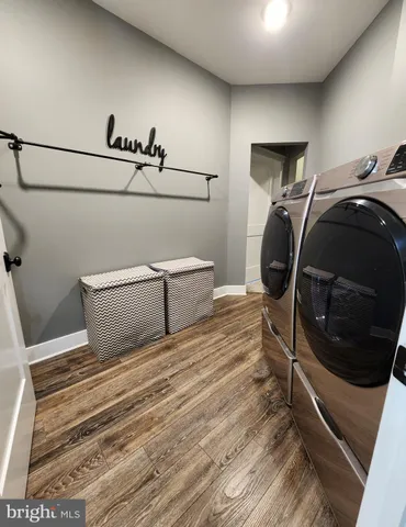 a bedroom with a bed and a mirror