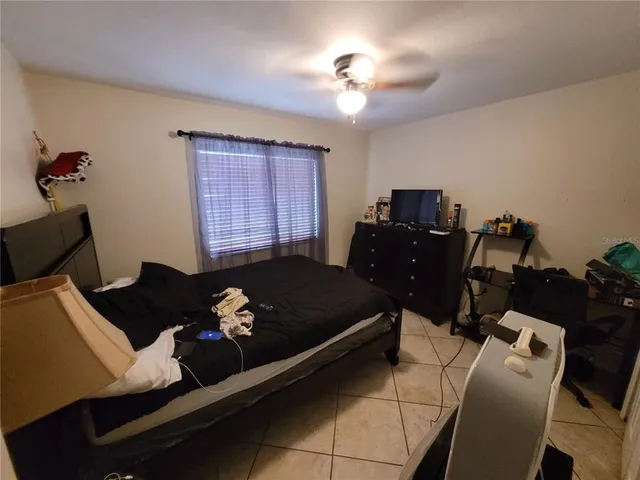 a bathroom with a sink vanity mirror and toilet