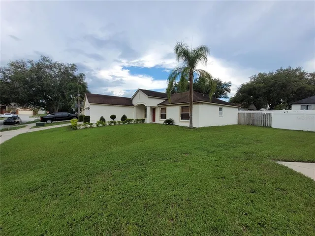 a front view of house with garden
