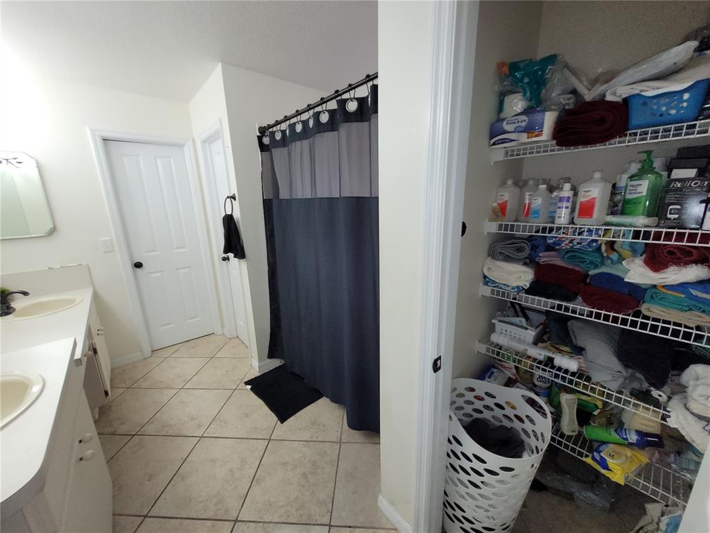 4233 Amber Ridge Lane Valrico, FL 33594 - Photo 24 of 40 a kitchen with a refrigerator and a stove