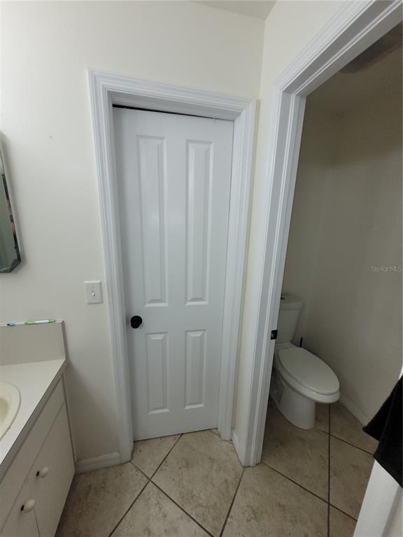 4233 Amber Ridge Lane Valrico, FL 33594 - Photo 26 of 40 a bathroom with a sink and a toilet