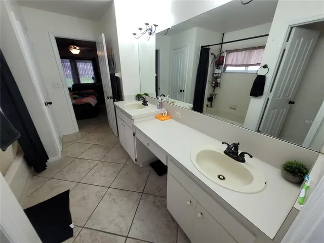 a view of storage and utility room with washer and dryer