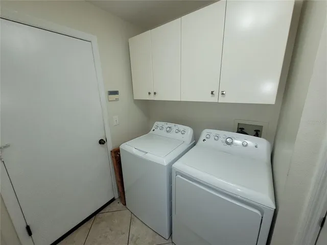 a view of a garage with wooden floor