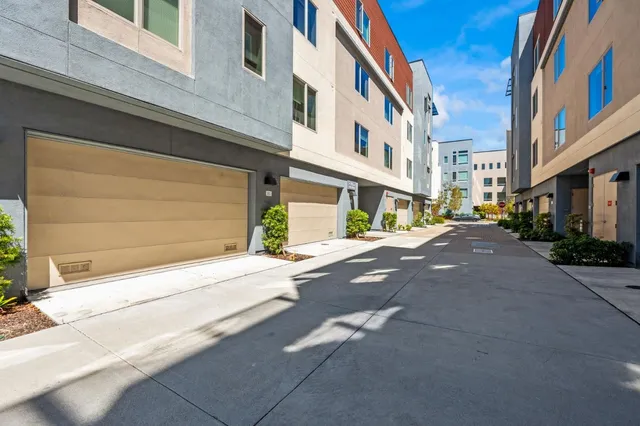a potted plant sitting on the side of a building