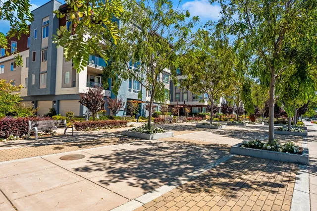 a view of a building with sitting area