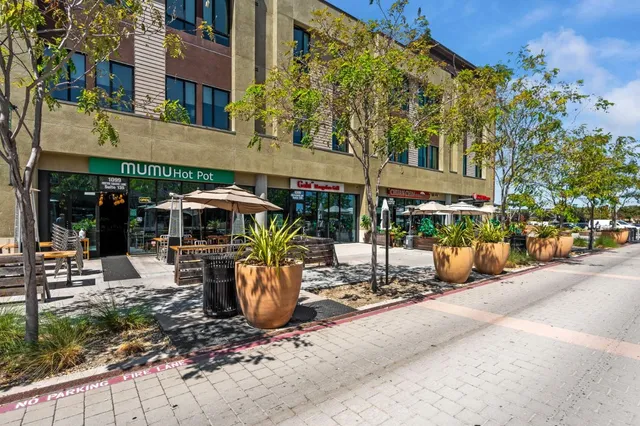 a view of a table and chairs in the patio