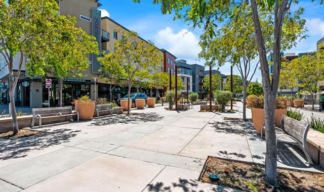 a view of a building with sitting area