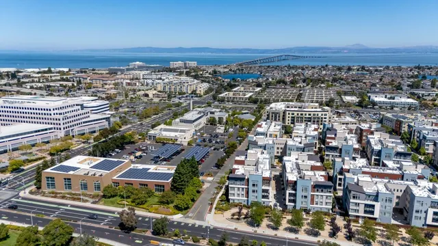 an aerial view of a city with lots of residential buildings